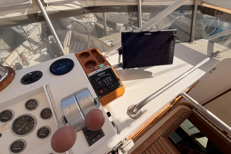 All The Way Yacht Photos Pics Control panel of a 1984 Hartman-Palmer 60 Flush Deck Motor Yacht with navigation equipment.