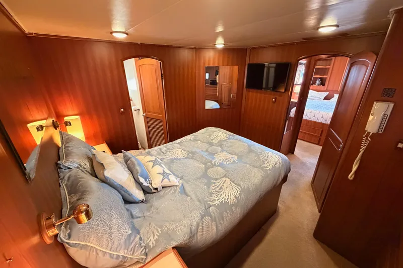 All The Way Yacht Photos Pics Luxurious bedroom interior of 1984 Hartman-Palmer 60 Flush Deck Motor Yacht.