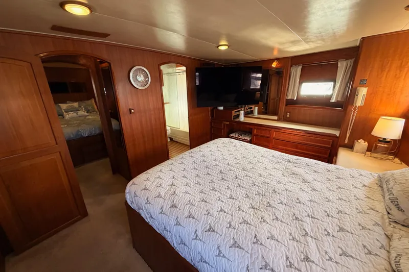 All The Way Yacht Photos Pics Luxurious bedroom interior of 1984 Hartman-Palmer 60 Flush Deck Motor Yacht.