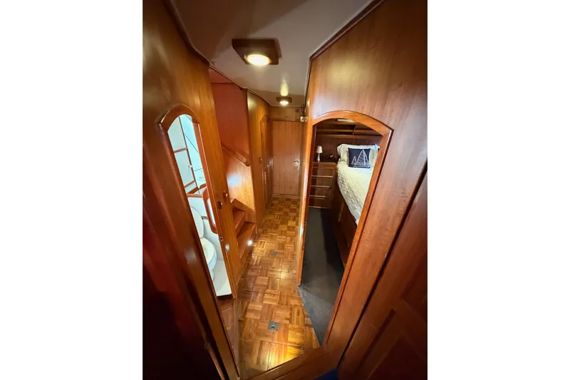 All The Way Yacht Photos Pics Interior of 1984 Hartman-Palmer 60 Flush Deck Motor Yacht with wooden finishes.