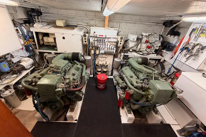 All The Way Yacht Photos Pics Engine room of 1984 Hartman-Palmer 60 Flush Deck Motor Yacht with dual engines and equipment.
