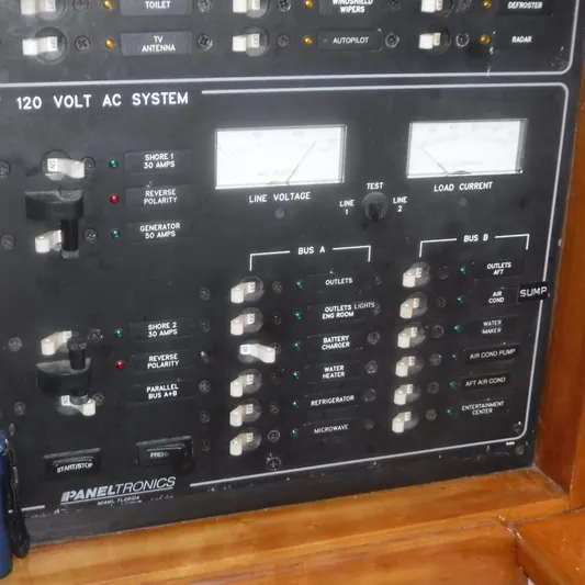 Ping Yacht Photos Pics Electrical panel of 1998 Legacy 40' Flybridge boat, showing 120V AC system controls.