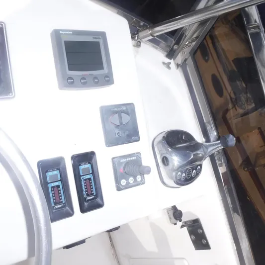Ping Yacht Photos Pics Control panel of 1998 Legacy 40' Flybridge boat with navigation instruments.