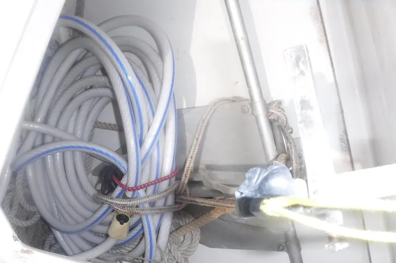 Ping Yacht Photos Pics Coiled ropes and cables in a 1998 Legacy 40' Flybridge compartment.