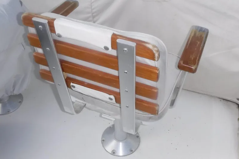 Ping Yacht Photos Pics Wooden and metal boat seat on 1998 Legacy 40' Flybridge.