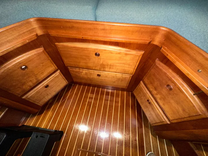  Yacht Photos Pics Wooden cabinetry and flooring inside a 2001 Sabre Sabreline 43 boat interior.