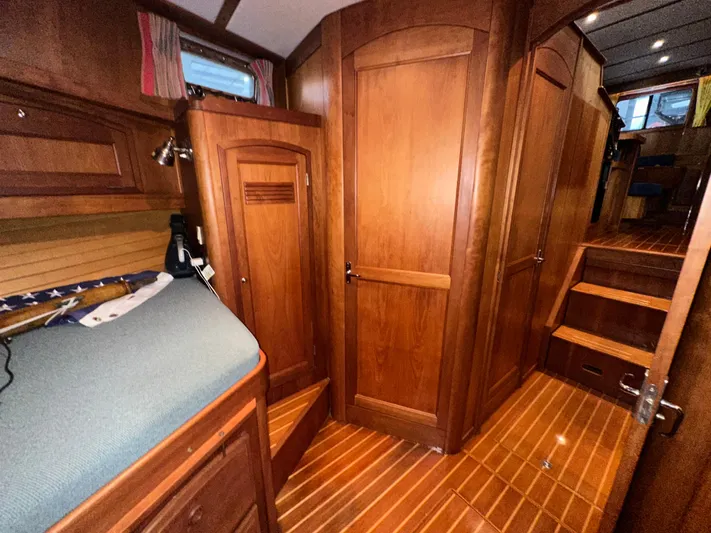  Yacht Photos Pics Interior of 2001 Sabre Sabreline 43 yacht with wooden cabinetry and flooring.