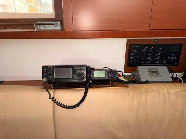 Wildflower III Yacht Photos Pics Radio equipment and control panel inside a 2016 Beneteau Oceanis 45 yacht.