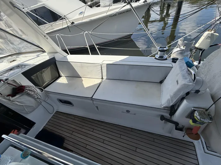 Wildflower III Yacht Photos Pics Cockpit of 2016 Beneteau Oceanis 45 sailboat with cushioned seating and nautical equipment.