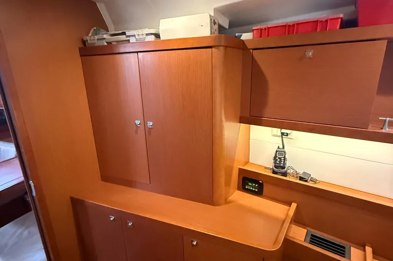 Wildflower III Yacht Photos Pics Interior of 2016 Beneteau Oceanis 45 yacht with wooden cabinetry and storage.