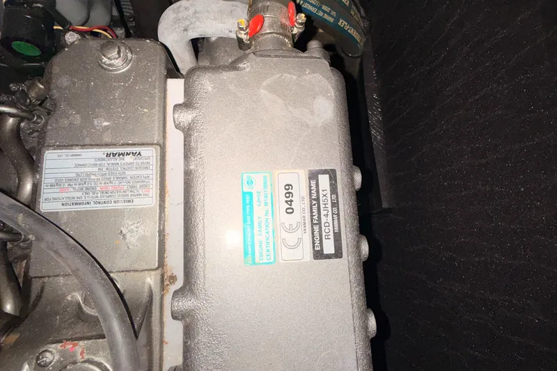 Wildflower III Yacht Photos Pics Engine compartment of a 2016 Beneteau Oceanis 45 sailboat, featuring a Yanmar engine.
