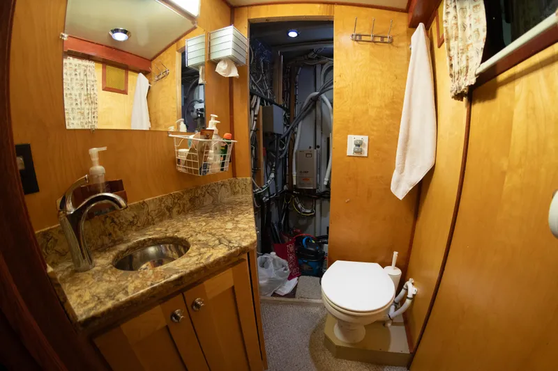 Harborviewbayview Yacht Photos Pics 1993 Custom Steel Trawler bathroom with sink, toilet, and storage.