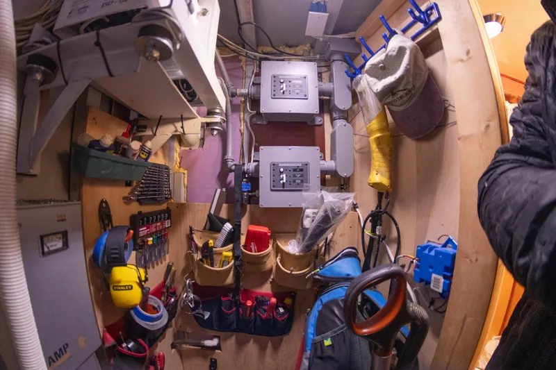 Harborviewbayview Yacht Photos Pics 1993 Custom Steel Trawler engine room with tools and equipment.