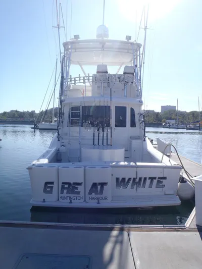 Great White Yacht Photos Pics 2001 Cabo Flybridge boat named "Great White" docked at Huntington Harbour.