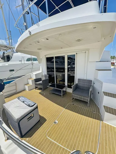 Knot Stupid Yacht Photos Pics 2005 Fountaine Pajot HIGHLAND yacht deck with seating and modern design.