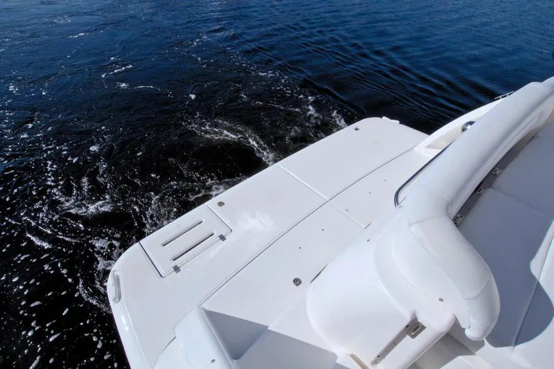 The Adventure Yacht Photos Pics 2008 Tiara Yachts 4300 Sovran's deck overlooking calm water.