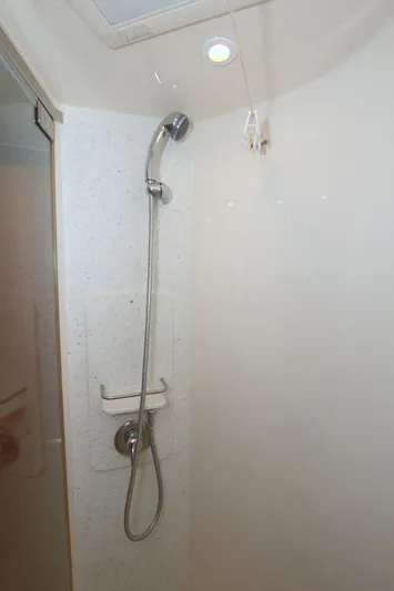 The Adventure Yacht Photos Pics Shower area in 2008 Tiara Yachts 4300 Sovran, featuring modern fixtures and lighting.