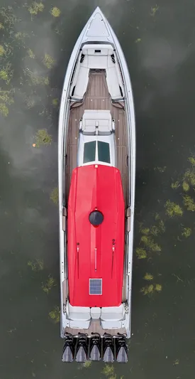  Yacht Photos Pics Overhead view of 2022 Nor-Tech 50 Sport boat with red cover on water.