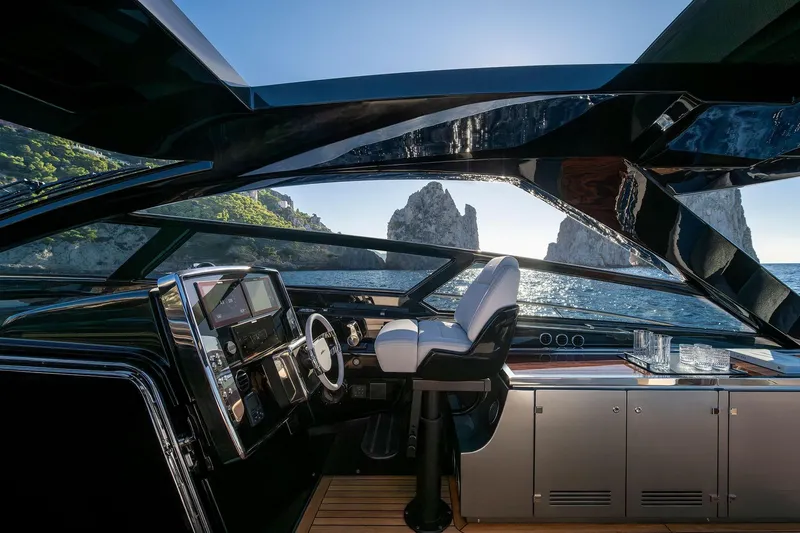  Yacht Photos Pics Luxurious interior of 2025 Riva Capri 58 yacht with scenic ocean view.