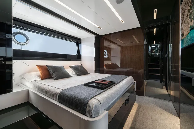  Yacht Photos Pics Luxurious interior of 2025 Riva Capri 58 yacht with modern bedroom design.