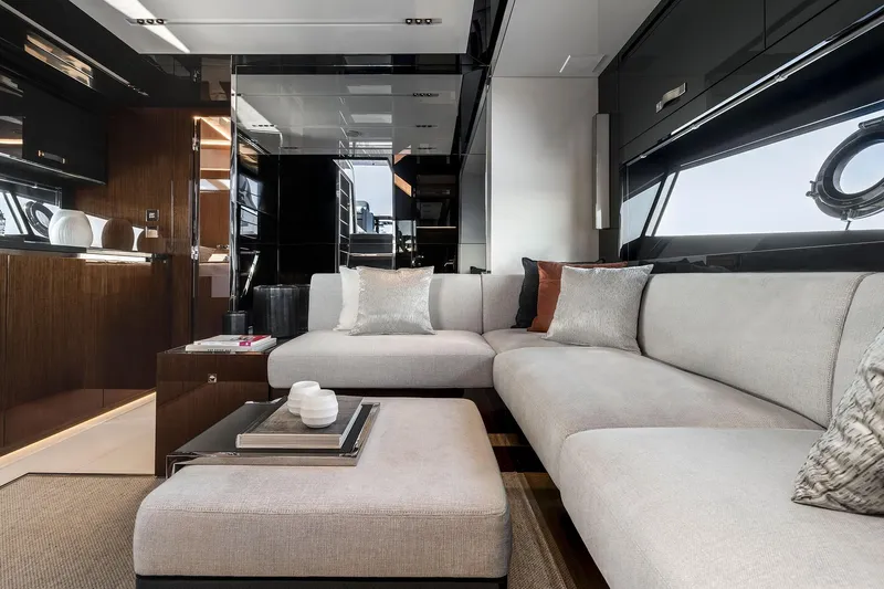  Yacht Photos Pics Luxurious interior of 2025 Riva Capri 58 yacht with modern furnishings and elegant decor.