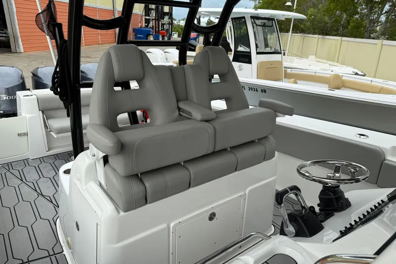 Thirty Percent Yacht Photos Pics 2021 Cape Horn 36 XS boat interior with gray seating and steering wheel.