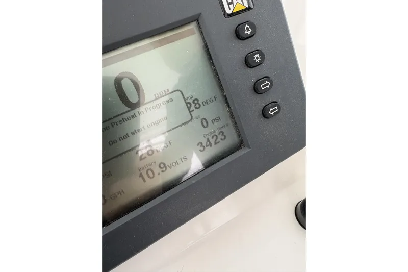  Yacht Photos Pics Close-up of a 2006 Rampage 38 Express boat control panel display.