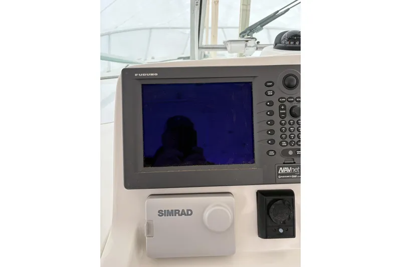  Yacht Photos Pics Control panel of a 2006 Rampage 38 Express boat with navigation equipment.