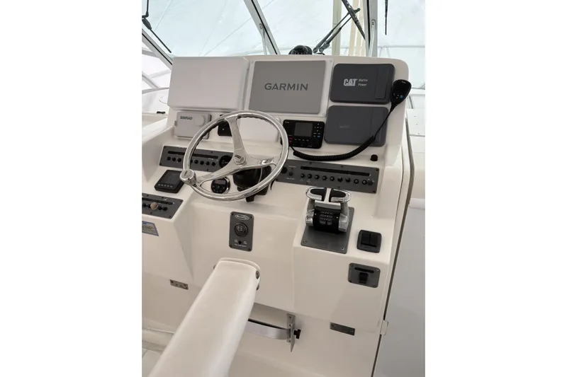 Yacht Photos Pics Control panel of a 2006 Rampage 38 Express boat with Garmin navigation system.
