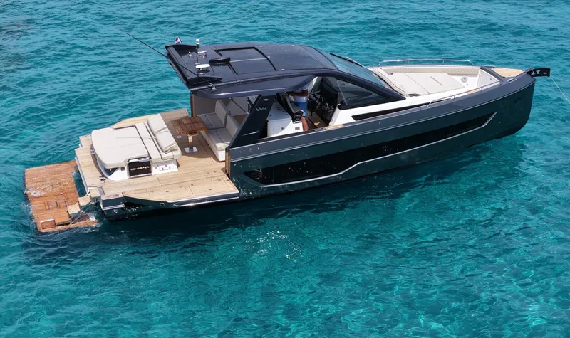  Yacht Photos Pics Luxury Schaefer V44 yacht on clear blue water, 2025 model.