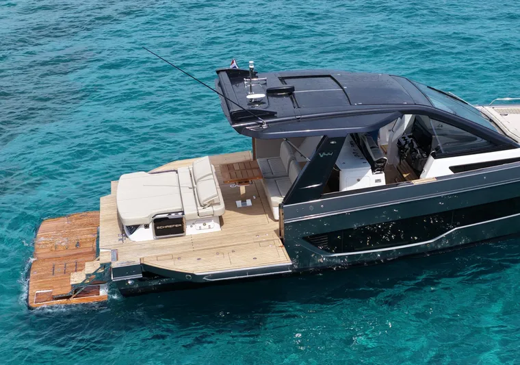  Yacht Photos Pics Schaefer V44 yacht, 2025 model, cruising on clear blue water.