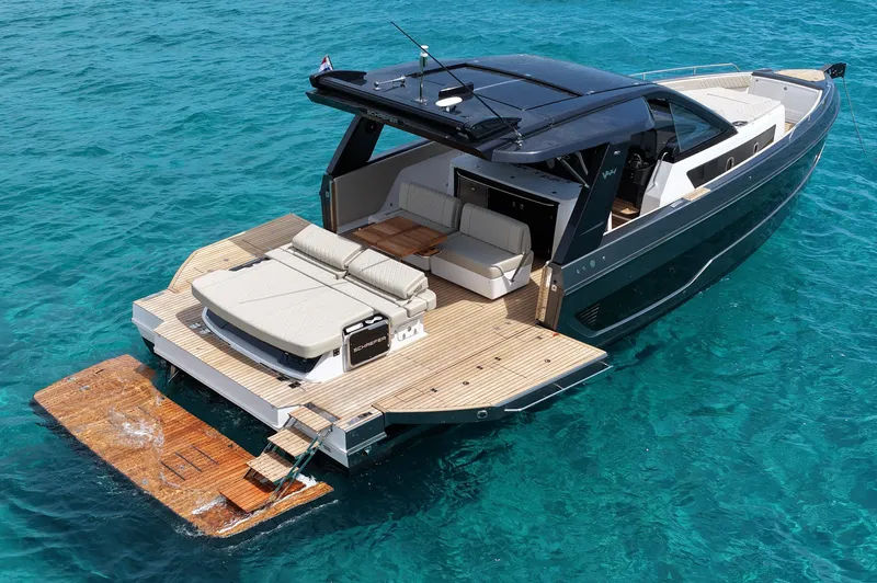  Yacht Photos Pics Luxury Schaefer V44 yacht, 2025 model, cruising on clear blue waters.