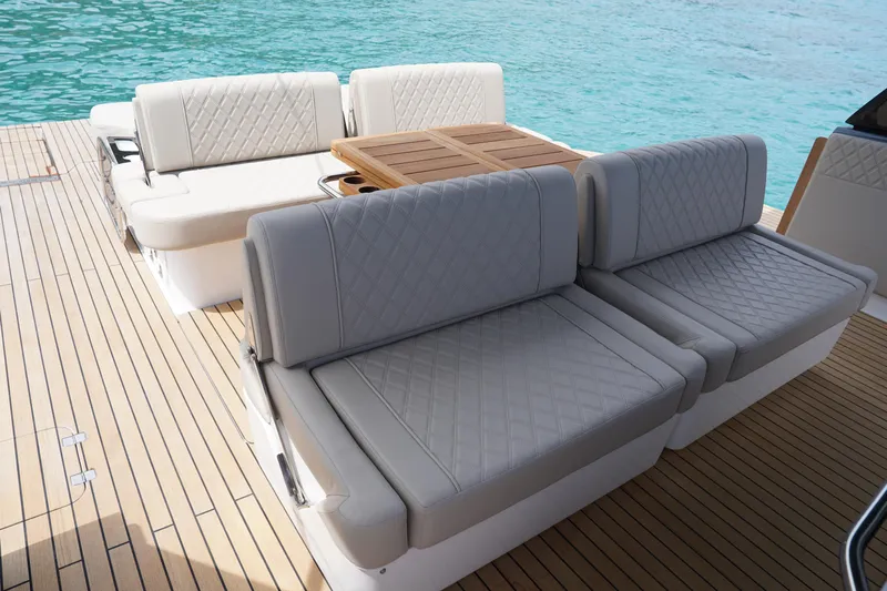  Yacht Photos Pics Luxurious seating on 2025 Schaefer V44 yacht with elegant quilted upholstery.