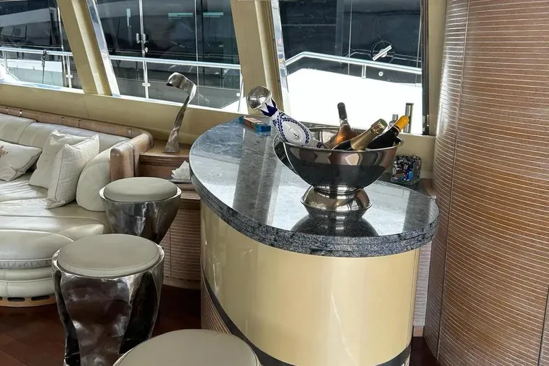  Yacht Photos Pics Luxurious Mondomarine 30 yacht interior with elegant bar and seating, 1995 model.