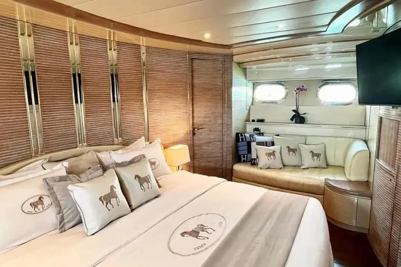  Yacht Photos Pics Luxurious Mondomarine 30 yacht bedroom, elegant decor, plush bedding, cozy seating, 1995 model.