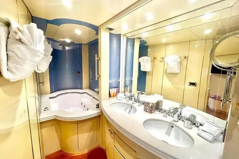  Yacht Photos Pics Luxurious bathroom on 1995 Mondomarine 30 yacht with double sinks and jacuzzi tub.