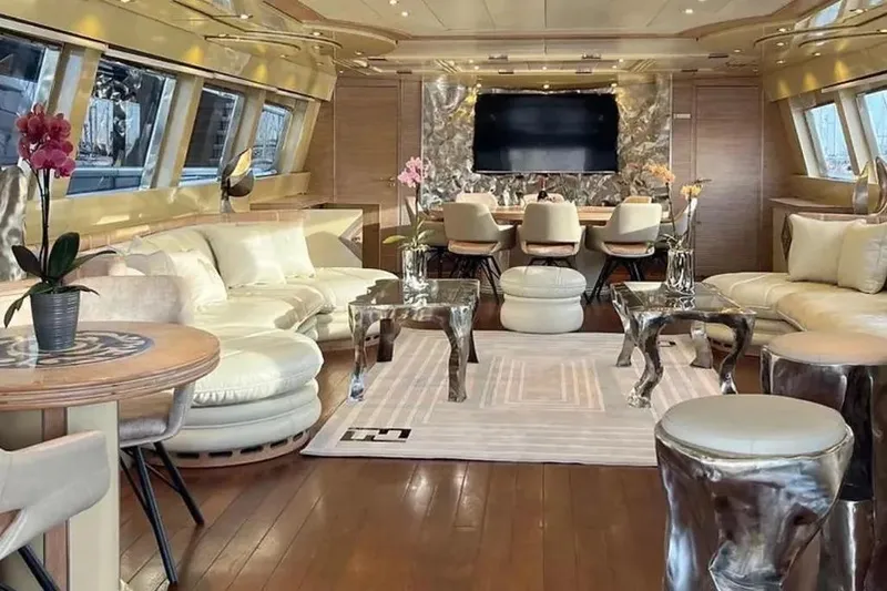  Yacht Photos Pics Luxurious interior of 1995 Mondomarine 30 yacht with elegant seating and modern decor.