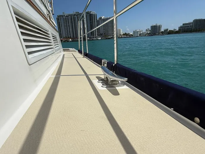 Fiji Yacht Photos Pics 1999 Grand Banks 49 Eastbay HX yacht deck with ocean view and city skyline.