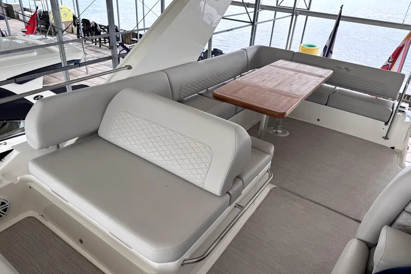 Smooth Yacht Photos Pics 2018 Sea Ray Fly 460 yacht interior with elegant seating and wooden table.
