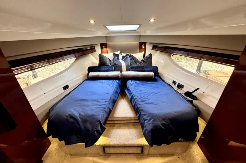 Smooth Yacht Photos Pics Luxurious 2018 Sea Ray Fly 460 yacht cabin with twin beds and elegant decor.