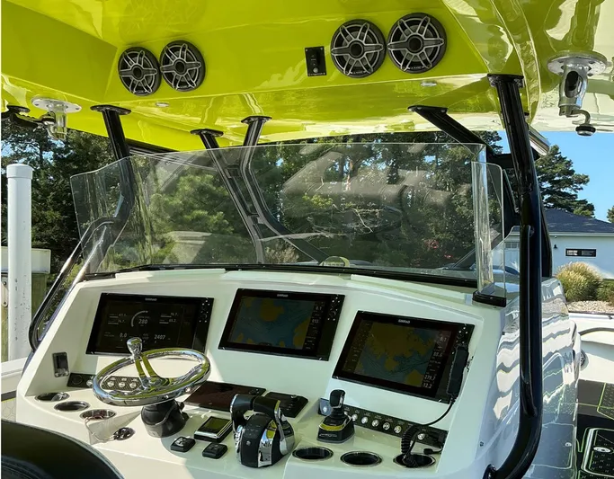 Big Sexy Yacht Photos Pics 2020 Prowler 42 boat dashboard with navigation screens and controls.