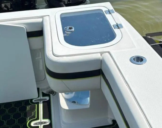 Big Sexy Yacht Photos Pics 2020 Prowler 42 boat interior with seating and storage compartment.
