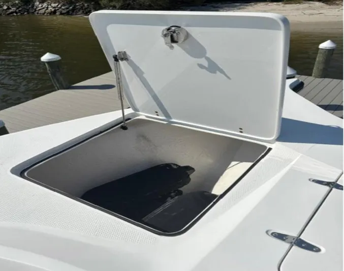 Big Sexy Yacht Photos Pics Open storage compartment on a 2020 Prowler 42 boat, dockside view.