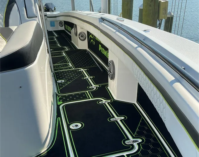 Big Sexy Yacht Photos Pics 2020 Prowler 42 boat interior with custom black and green flooring design.