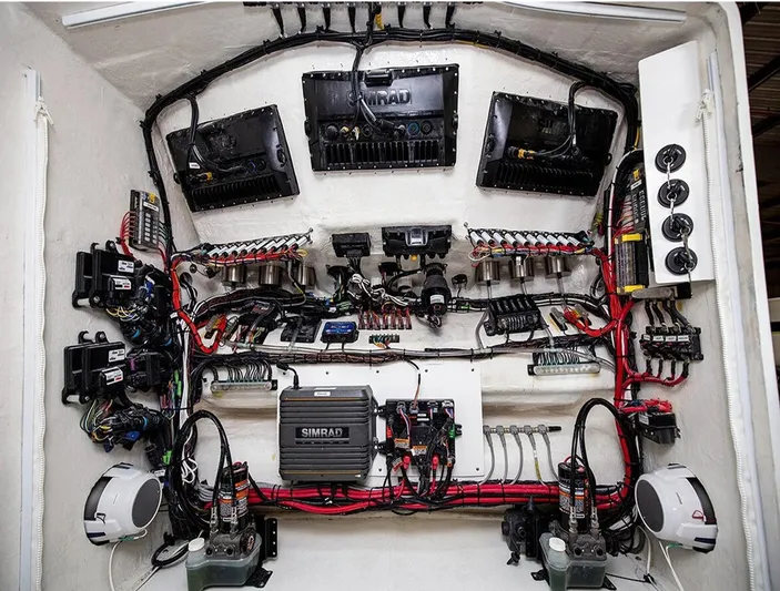 Big Sexy Yacht Photos Pics Electrical system of a 2020 Prowler 42, featuring complex wiring and components.