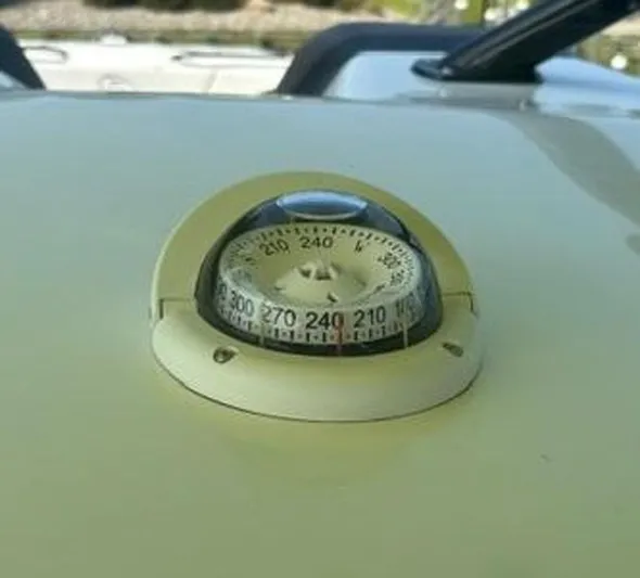 Big Sexy Yacht Photos Pics Close-up of a compass on a 2020 Prowler 42 boat deck.