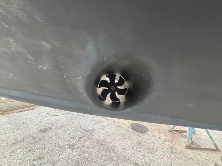  Yacht Photos Pics 2022 Fountain 38 SC boat hull with a visible thruster.