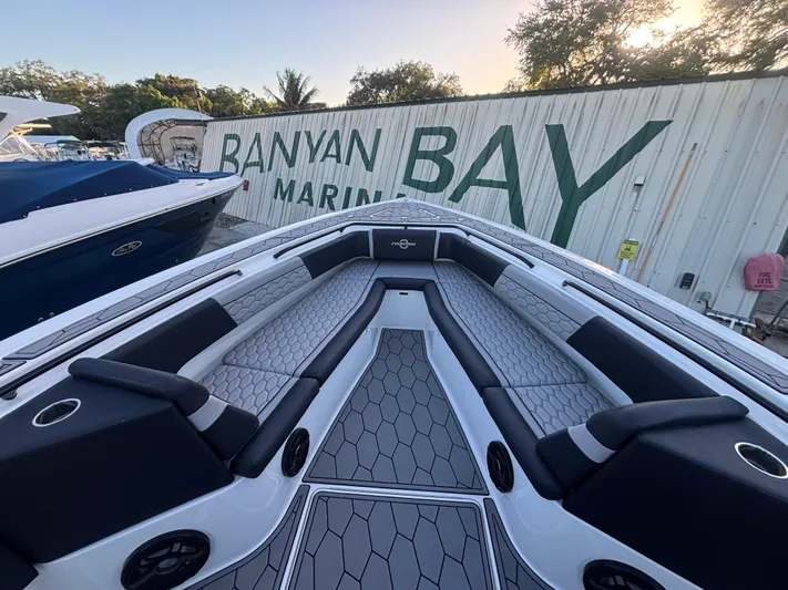  Yacht Photos Pics 2022 Fountain 38 SC boat interior at Banyan Bay Marina, featuring sleek seating and modern design.