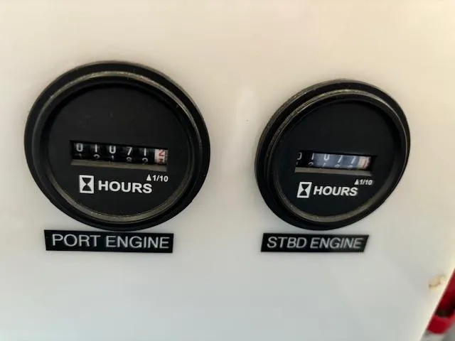 Morning Star V Yacht Photos Pics Hour meters for port and starboard engines on a 1997 Albin 31 Tournament boat.