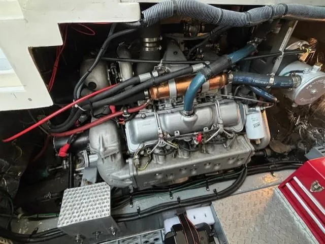 Morning Star V Yacht Photos Pics Engine compartment of a 1997 Albin 31 Tournament boat, showcasing detailed mechanical components.